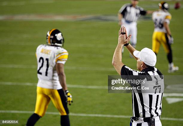 Referee Terry McAulay signals for a safety after ceneter Justin Hartwig of the Pittsburgh Steelers was called for holding in the endzone in the...