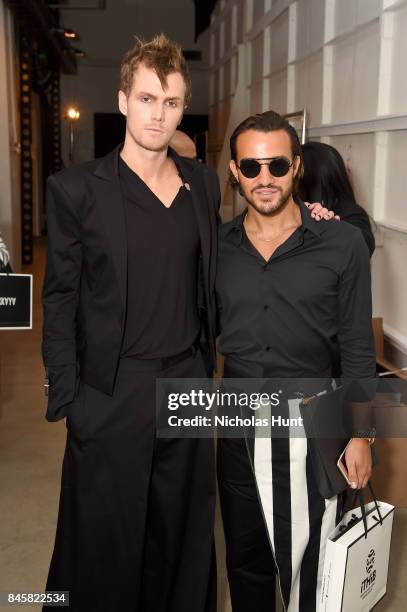 Barron Hilton and Emir Bahadir pose backstage for Hakan Akkaya fashion show during New York Fashion Week: The Shows at Gallery 2, Skylight Clarkson...