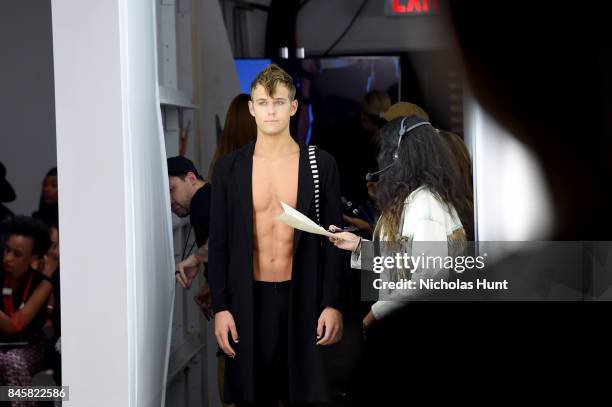 Model prepares backstage for Hakan Akkaya fashion show during New York Fashion Week: The Shows at Gallery 2, Skylight Clarkson Sq on September 11,...