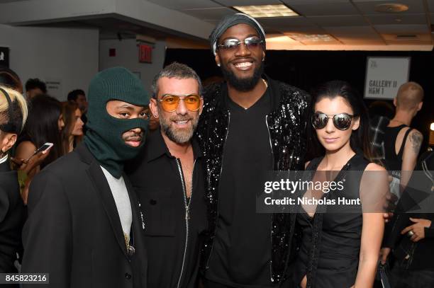 Hakan Akkaya, Kenneth Faried, and guests pose backstage for Hakan Akkaya fashion show during New York Fashion Week: The Shows at Gallery 2, Skylight...