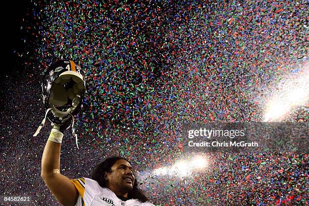 Troy Polamalu of the Pittsburgh Steelers celebrates as confetti falls after they 27-23 win against the Arizona Cardinals during Super Bowl XLIII on...