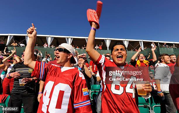 The fans on cheer for a shot during the final round of the FBR Phoenix Open held at TPC Scottsdale on February 1, 2009 in Scottsdale, Arizona.