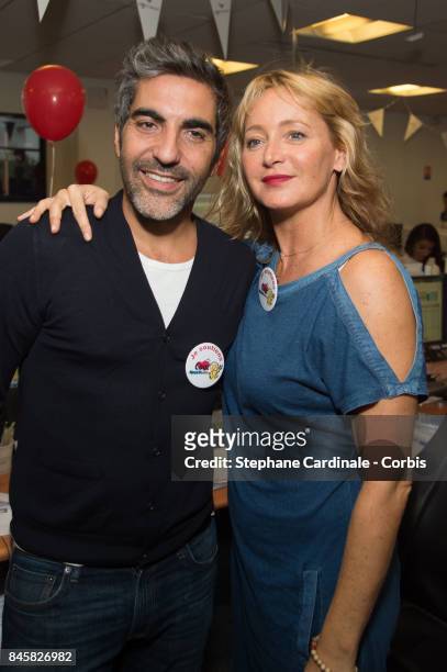 Ary Abittan and Julie Ferrier attend the Aurel BCG Charity Benefit Day 2017 on September 11, 2017 in Paris, France.