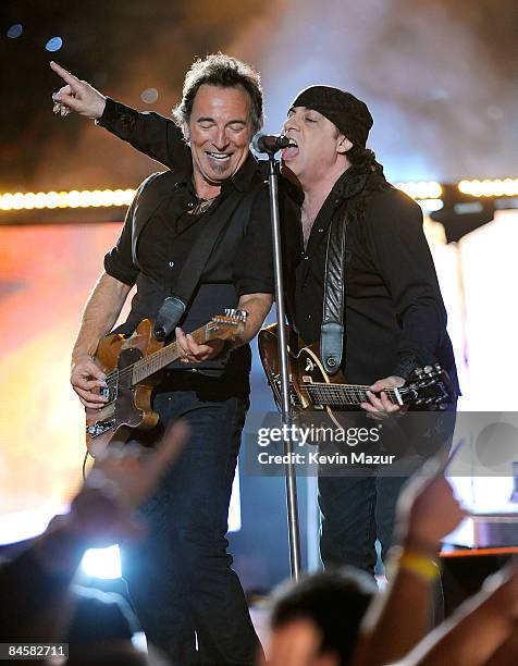 Musicians Bruce Springsteen and Steven Van Zandt of the E Street Band perform at the Bridgestone halftime show during Super Bowl XLIII between the...