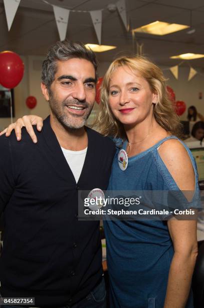 Ary Abittan and Julie Ferrier attend the Aurel BCG Charity Benefit Day 2017 on September 11, 2017 in Paris, France.
