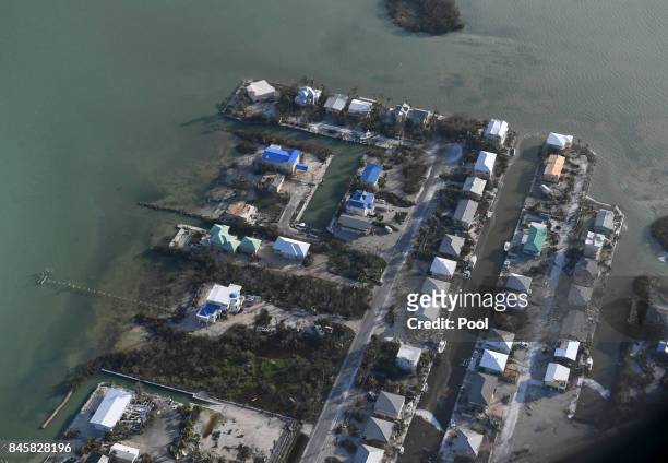 Damaged houses are seen in the aftermath of Hurricane Irma on September 11, 2017 over the Florida Keys, Florida