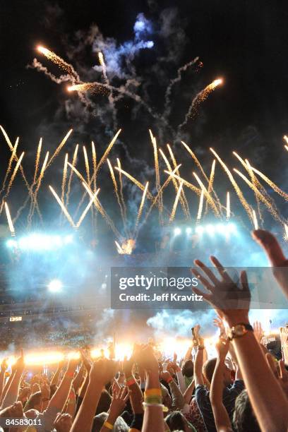 Musician Bruce Springsteen and the E Street Band perform at the Bridgestone halftime show during Super Bowl XLIII between the Arizona Cardinals and...