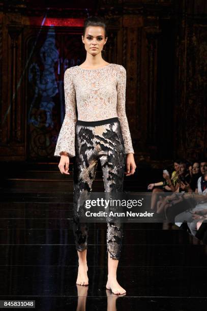 Model walks the runway for the 21 Reasons Why by Madeline Stuart fashion show during New York Fashion Week NYFW Art Hearts Fashion at The Angel...