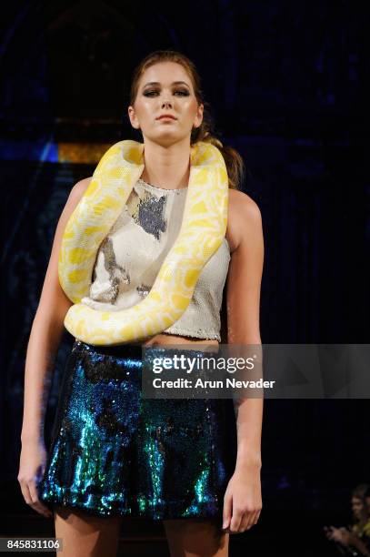 Model walks the runway for the 21 Reasons Why by Madeline Stuart fashion show during New York Fashion Week NYFW Art Hearts Fashion at The Angel...