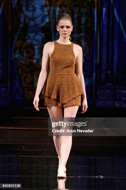 Model walks the runway for the 21 Reasons Why by Madeline Stuart fashion show during New York Fashion Week NYFW Art Hearts Fashion at The Angel...