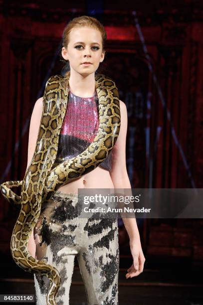 Model walks the runway for the 21 Reasons Why by Madeline Stuart fashion show during New York Fashion Week NYFW Art Hearts Fashion at The Angel...