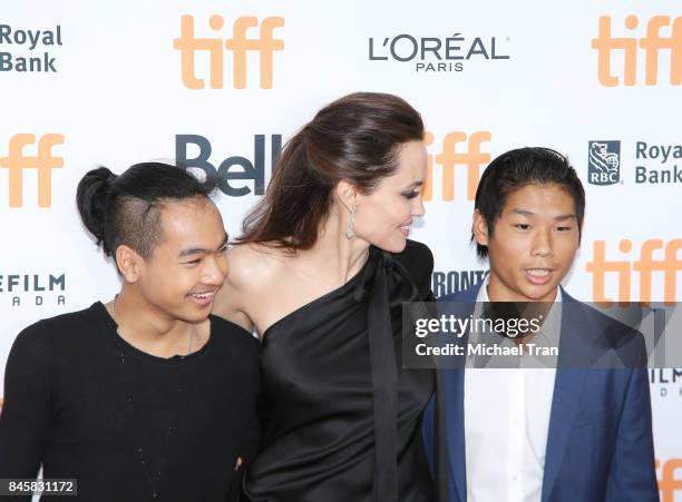 Angelina Jolie with her sons, Maddox Chivan Jolie-Pitt and Pax Thien Jolie-Pitt arrive to "First They Killed My Father: A Daughter of Cambodia...