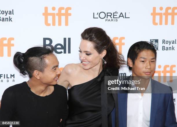 Angelina Jolie with her sons, Maddox Chivan Jolie-Pitt and Pax Thien Jolie-Pitt arrive to "First They Killed My Father: A Daughter of Cambodia...