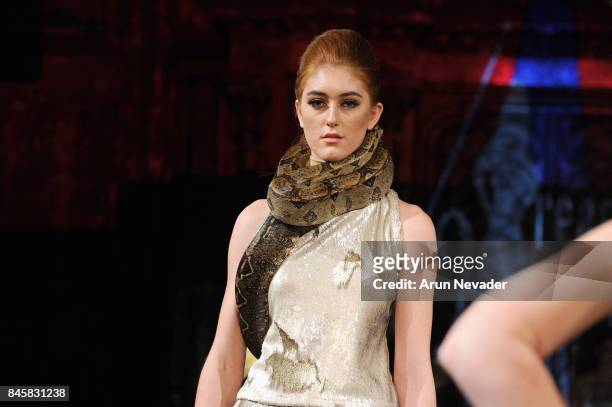 Model walks the runway for the 21 Reasons Why by Madeline Stuart fashion show during New York Fashion Week NYFW Art Hearts Fashion at The Angel...