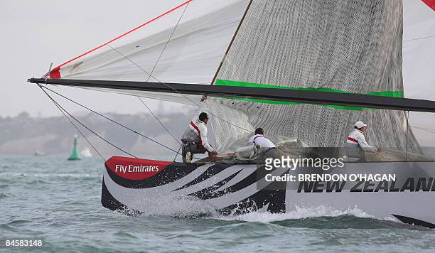 Luna Rossa from Italy prepares to bring in its spinaker during the fourth day of the Louis Vuitton Pacific Cup Series yachting regatta in Auckland on...
