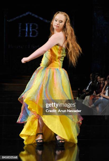 Model Madeline Stuart walks the runway for the House of Byfield fashion show during New York Fashion Week NYFW Art Hearts Fashion at The Angel...