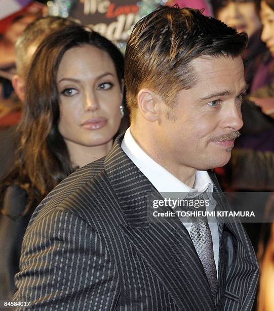 Actor Brad Pitt and his wife Angelina Jolie attend red carpet Japanese premier of his latest movie "The Curious Case of Benjamin Button" in Tokyo on...