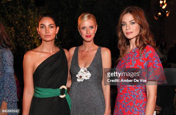 Lily Aldridge, Nicky Hilton Rothschild and Michelle Monaghan attend the Carolina Herrera show at The Museum of Modern Art on September 11, 2017 in...