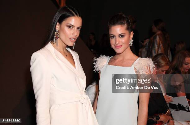 Agustina Marzari and Agustina Casanova attend the Carolina Herrera show at The Museum of Modern Art on September 11, 2017 in New York City.