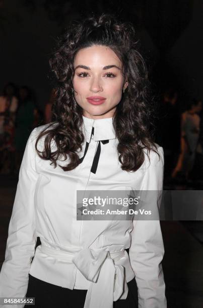 Crystal Reed attends the Carolina Herrera show at The Museum of Modern Art on September 11, 2017 in New York City.