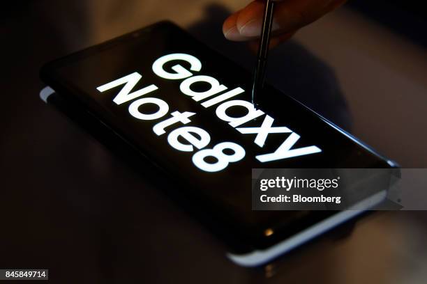 Samsung Electronics Co. Galaxy Note 8 smartphone and S Pen stylus are displayed during a media event in Seoul, South Korea, on Tuesday, Sept. 12,...