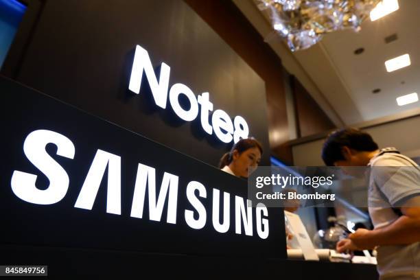 Samsung Electronics Co. Signage is displayed at a media event for the Galaxy Note 8 smartphone in Seoul, South Korea, on Tuesday, Sept. 12, 2017....