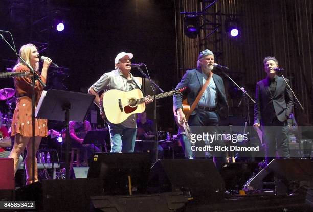 Musicians Miranda Lambert, George Strait, Robert Earl Keen and Lyle Lovett perform onstage during George Strait's Hand In Hand benefit concert...