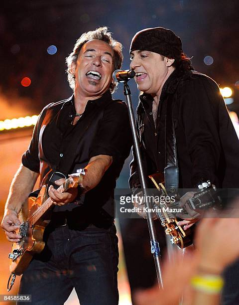 Musicians Bruce Springsteen and Steven Van Zandt of the E Street Band perform at the Bridgestone halftime show during Super Bowl XLIII between the...