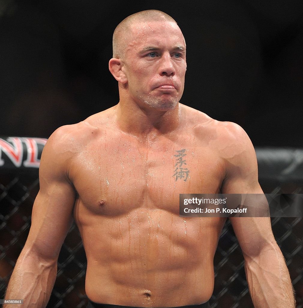 George Ufc Georges St-Pierre waits for the second round to start against BJ Penn ...