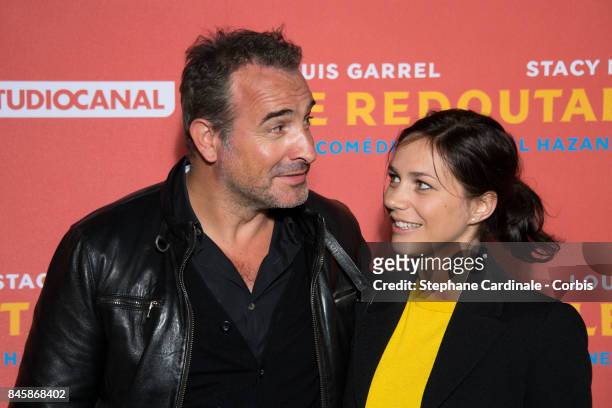 Actor Jean Dujardin and Nathalie Pechalat attend the "Le Redoutable" Paris Premiere at Cinema du Pantheon on September 11, 2017 in Paris, France.