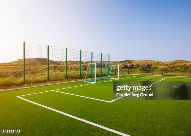 football pitch in the dunes - サッカー場　無人 ストックフォトと画像