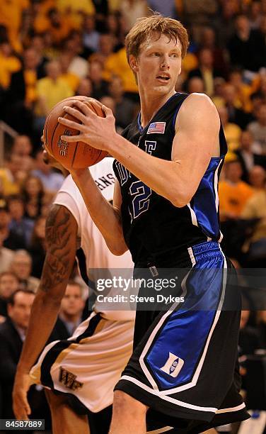 Kyle Singler of the Duke Blue Devils looks for an open man in the second half of the game against the Wake Forest Demon Deacons at Lawrence Joel...