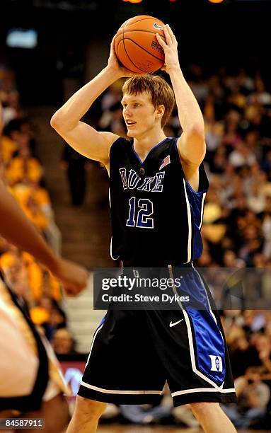 Kyle Singler of the Duke Blue Devils looks for an open man in the second half of the game against the Wake Forest Demon Deacons at Lawrence Joel...