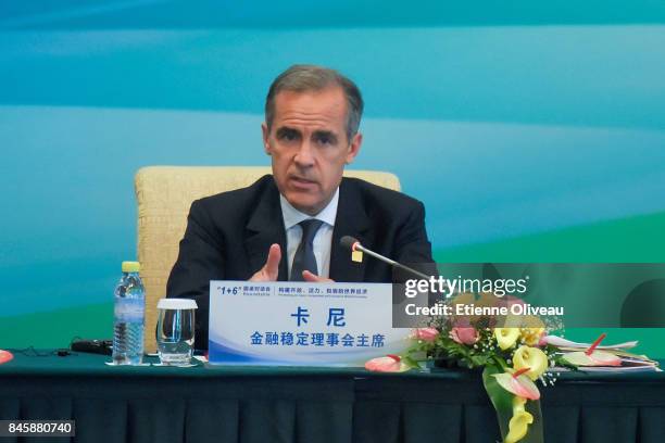 Chairman Mark Carney of the G20's Financial Stability Board speaks during The 1+6 Round Table Press Conference at Diaoyutai State Guesthouse on...