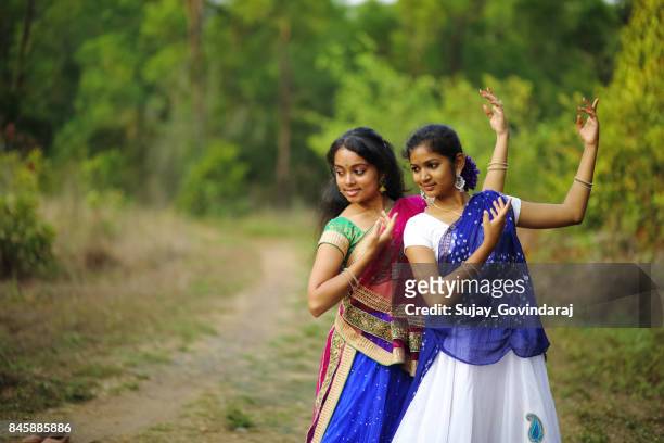 two female dancers performing kathak - indian dance stock pictures, royalty-free photos & images
