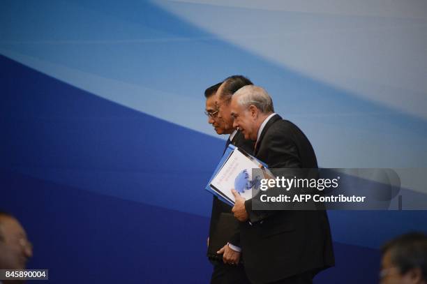 President of the World Bank Jim Yong Kim , Chinese Premier Li Keqiang and secretary-general of the Organisation of Economic Co-operation and...