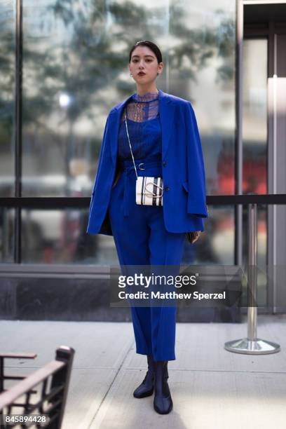Ayaka Miyoshi is seen attending 3.1 Phillip Lim during New York Fashion Week wearing a blue dress and blazer on September 11, 2017 in New York City.