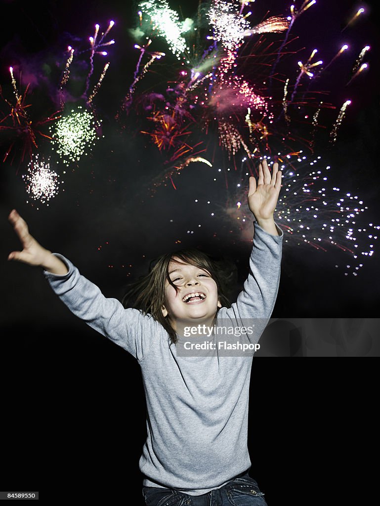Boy enjoying firework display