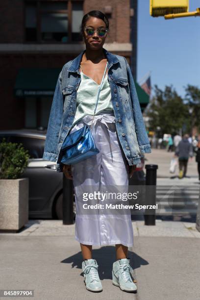 Andresha Debourg is seen attending Hakan Akkaya during New York Fashion Week wearing ASOS, Forever 21 on September 11, 2017 in New York City.