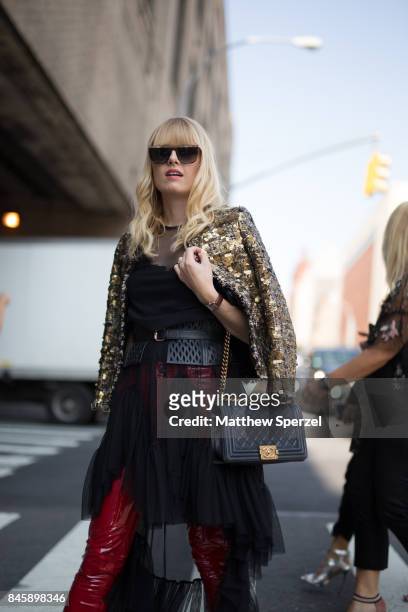 Stephanie is seen attending Hakan Akkaya during New York Fashion Week wearing a vintage outfit with Balenciaga shoes and Ulli Mahler sunglasses on...
