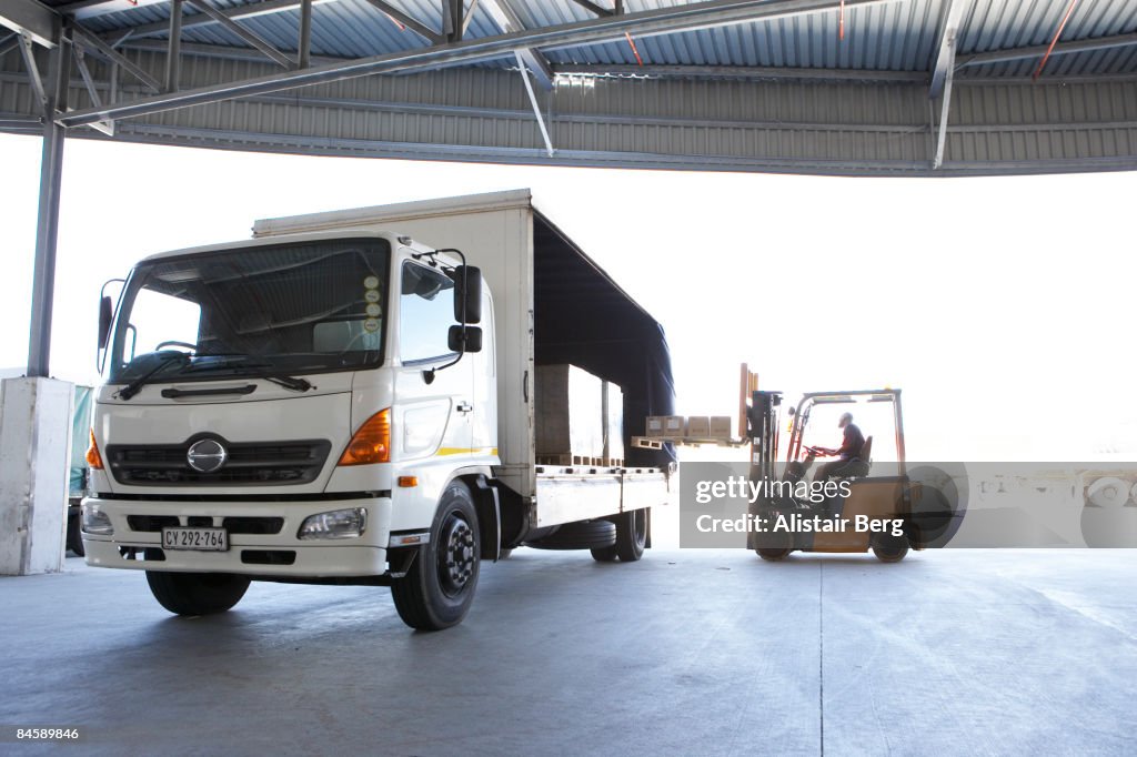 Fork lift truck loading lorry