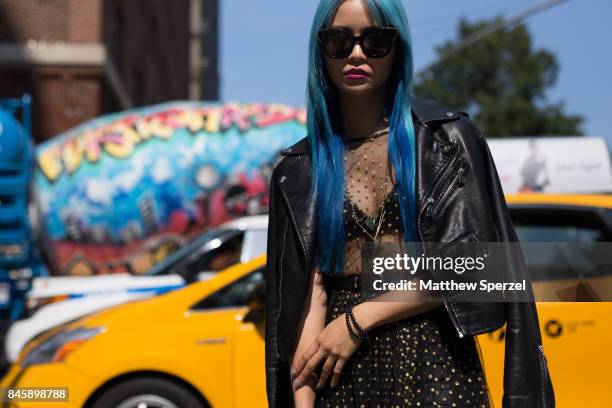 Yuki Bomb' Christina Pham is seen attending Hakan Akkaya during New York Fashion Week wearing Never Fully Dressed, Kate Spade bag on September 11,...