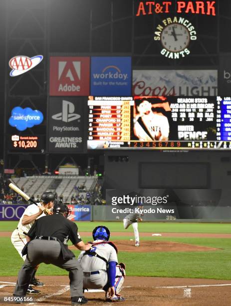 Kenta Maeda of the Los Angeles Dodgers pitches in the first inning against the San Francisco Giants at AT&amp;T Park in San Francisco on Sept. 11...