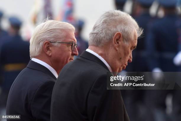 Czech President Milos Zeman and his German counterpart Frank-Walter Steinmeier review a guard of honor on September 12, 2017 at the start of their...