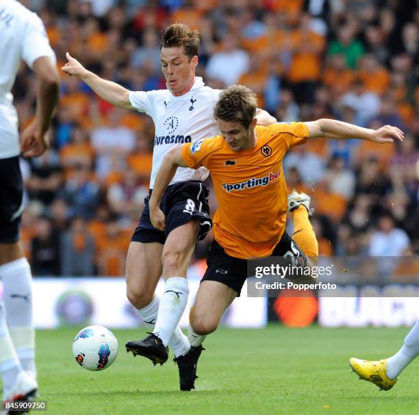 Scott Parker of Tottenham and Kevin Doyle of Wolverhampton in action during the Barclays Premiership match between Wolverhampton Wanderers and...