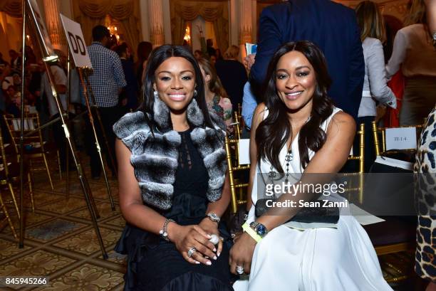 Keke Olise and E.J. Modo attend the Dennis Basso Spring/Summer 2018 Runway Show during New York Fashion Week at The Plaza Hotel on September 11, 2017...