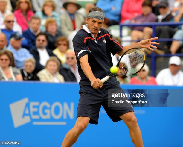 Frank Dancevic of Canada in action during the Men's Final against Dmitry Tursunov of Russia during day six of the AEGON International on June 20,...