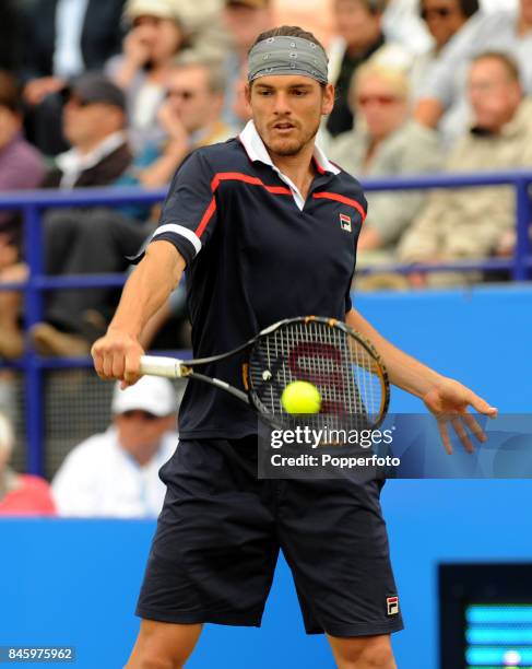 Frank Dancevic of Canada in action during the Men's Final against Dmitry Tursunov of Russia during day six of the AEGON International on June 20,...