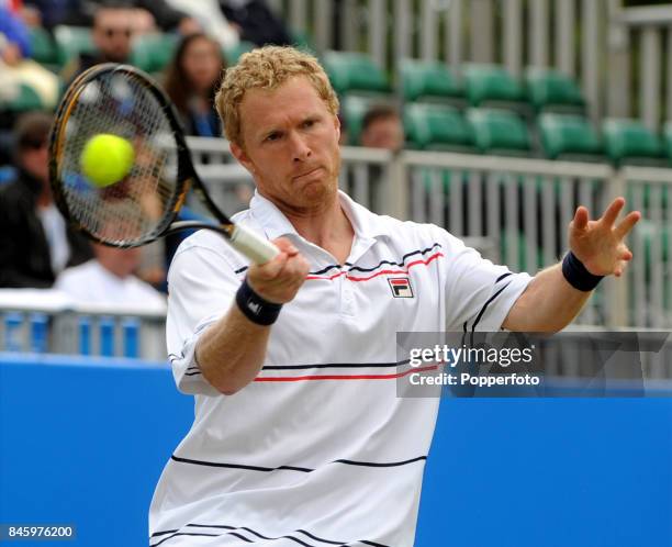 Dmitry Tursunov of Russia in action during the Men's Final against Frank Dancevic of Canada during day six of the AEGON International on June 20,...