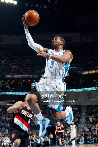 Chris Paul of the New Orleans Hornets shoots over Jerryd Bayless of the Portland Trail Blazers on February 2, 2009 at the New Orleans Arena in New...